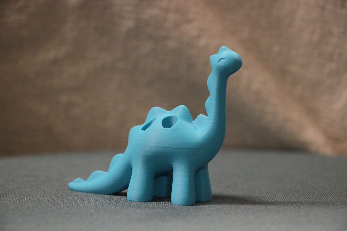 Kapselhalter Dino Türkis